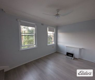 Spacious 2-Bedroom Duplex in Convenient Location - Photo 4