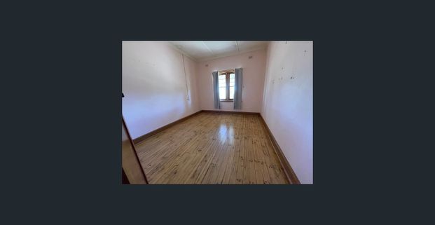 Charming 3-Bedroom Home - Photo 1