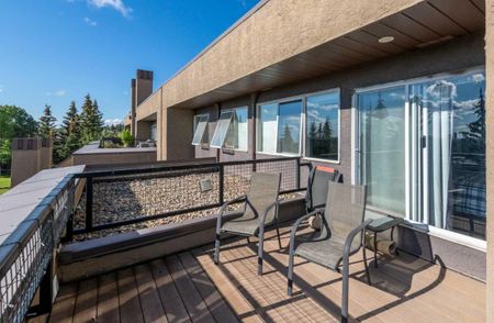 9, 122 Village Heights SW - 1 - Photo 2