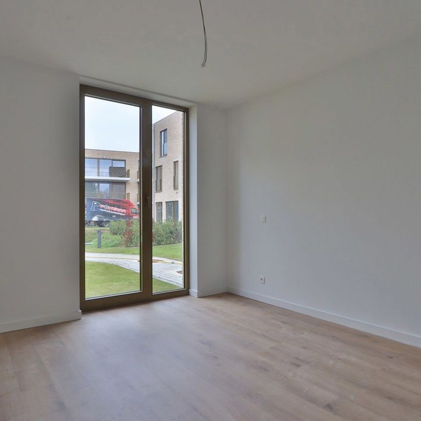 Nieuwbouwappartement met 3 slpks en autostaanplaats nabij centrum Beveren! - Photo 1