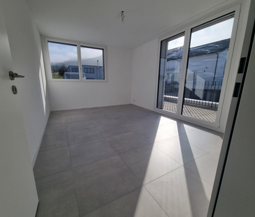 Geräumige Wohnung mit Sitzplatz - Foto 1