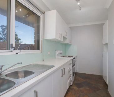 “Tidy Two Bedroom Unit” - Photo 4