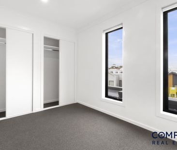 Easy Living in a 4-Bedroom Townhouse - Photo 1