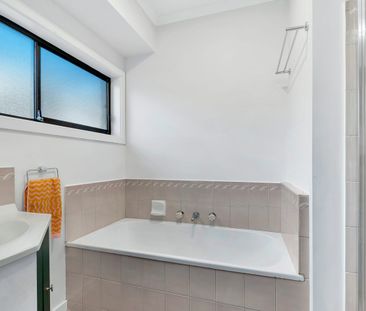 Low-Maintenance Coastal Living in a Prime Powell Street Location - Photo 5