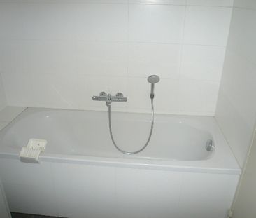 Een centraal gelegen appartement met 3 slaapkamers en terras - Photo 4