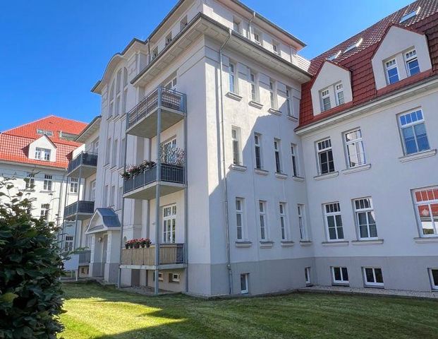 Wohnen im 1.OG / Bad mit Eckwanne / Balkon + Stellplatz u.v.m. - Photo 1