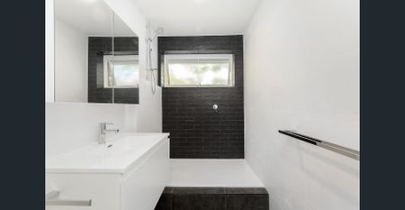 SUNLIT SANCTUARY IN THE HEART OF SANDY VILLAGE - Photo 3