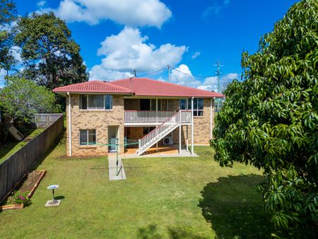 Spacious Family Home with Covered Deck and Convenient Location - Photo 5