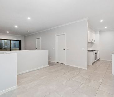 Modern Townhouse Living with Parkland Views - Photo 1