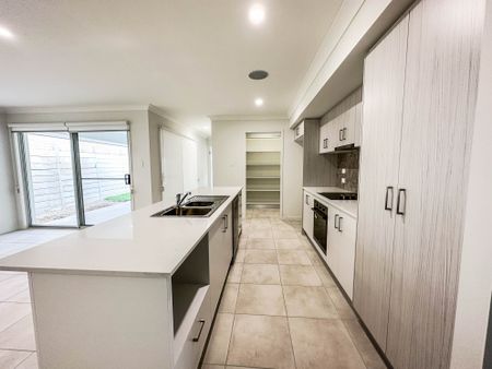 Spacious & Modern Family Home in Popular Location - Photo 5