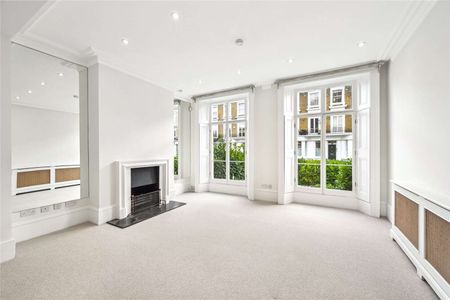 A spacious, five-bedroom family home spanning just under 3,000 sqft, in the heart of Chelsea, moments from the local amenities of the Fulham Road. - Photo 2