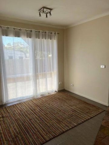 COSY FAMILY HOME IN QUIET COURT YARD LOCATION - Photo 2