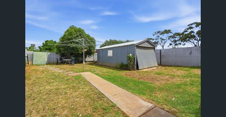 Updated 3-Bedroom Home with Large Backyard & Shed - Photo 5