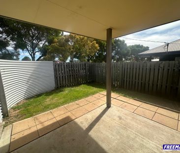 Neat & Low-Maintenance 3 Bedroom Home - Photo 2