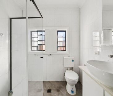 4-Bedroom Family Home with Modern Comforts and Expansive Outdoor Sp... - Photo 1