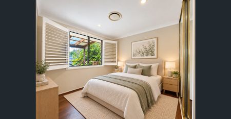 Spacious Four-Bedroom Family Home with Multiple Living Areas - Photo 4