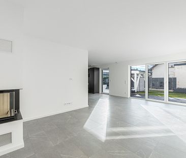 Neuwertige, trendbewusste Haushälfte mit 5,5 Zimmern, Südwestgarten und nachhaltigem Energiekonzept - Foto 1