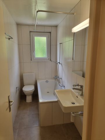 Appartement de 3 pièces au 1er étage avec part au grand jardin commun - Photo 5