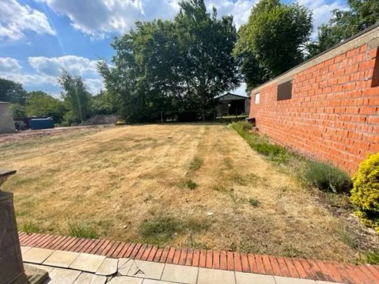 Gelijkvloers appartement met 2 slaapkamers en ruime tuin! - Photo 1