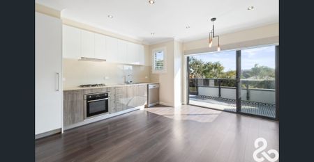 Stylish Two-Bedroom Townhouse in a Convenient Reservoir Location - Photo 4