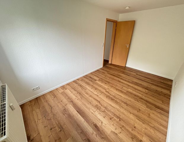 2-Raum-Wohnung mit Balkon und Blick ins Grüne - Foto 1