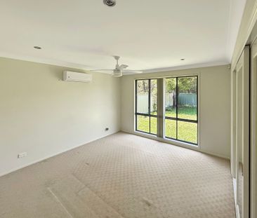 THE IDEAL FAMILY HOME IN SOUGHT-AFTER WARNERS BAY - Photo 1
