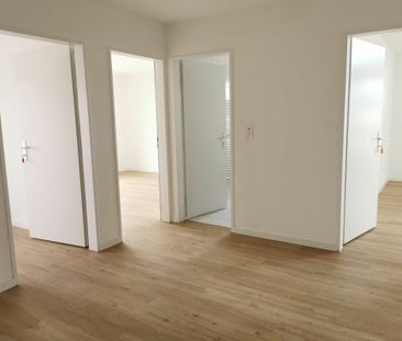 Attraktive Wohnung mit grosser Terrasse und neuer Küche - Foto 1