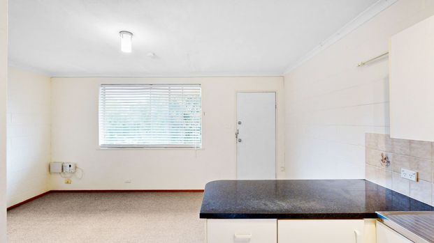 Affordable Comfort in a Prime Location - Photo 1