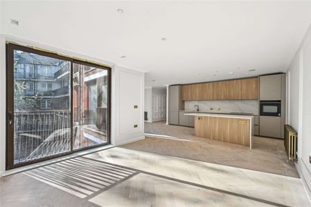 An excellent three bedroom flat in this new development located in central London. - Photo 2