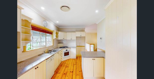 Beautiful Queenslander-Inspired Family Home in the Heart of Sherwood - Photo 1