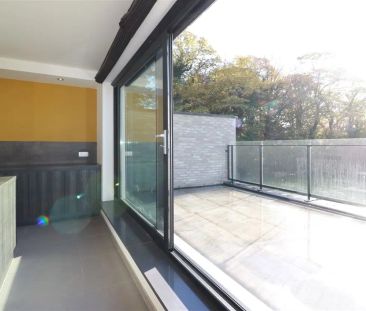 Duplex met 2 grote slpk., zuidgericht terras, 2 parkings nabij cent... - foto 4