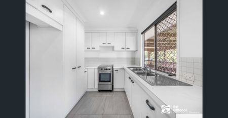 THREE BEDROOM FAMILY HOME IN BIRKDALE WITH A LARGE FULLY FENCED REAR YARD - Photo 4