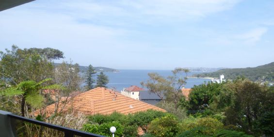 REFURBISHED 2 BEDROOM APARTMENT WITH VIEWS - Photo 3
