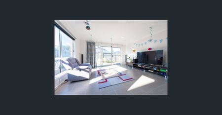 Modern Family Retreat with Multiple Living Spaces and Designer Finishes - Photo 5