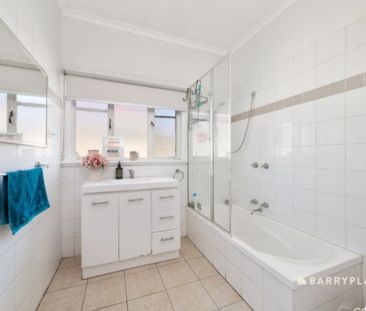Charming 3-Bedroom Home with Spacious Living and Great Location - Photo 6