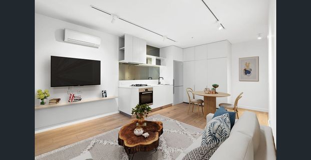 Stylish Lakeside Apartment with Inner-City Convenience - Photo 1