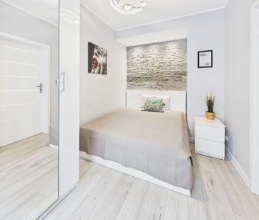 2 pokoje, balkon i garaż – komfort i styl w jednym - Фото 1