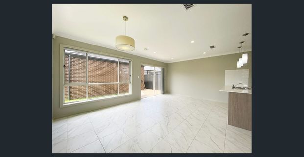 Modern Family Home in Prime Convenience | Walk to Schools, Station & Park - Photo 1