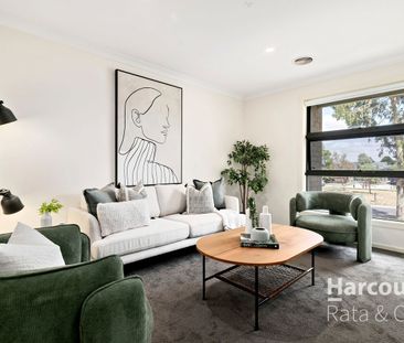 Impressive 4-Bedroom Home Offering Space and Comfort - Photo 1