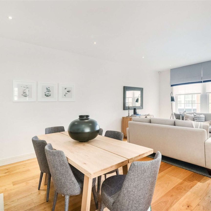 This spacious mews house situated within the gated development that is St. Barnabas Mews - Photo 1