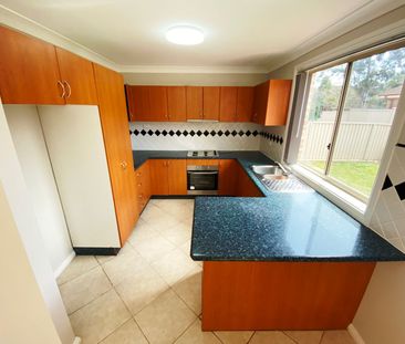 Immaculately Presented 4-Bedroom Family Home - Photo 6