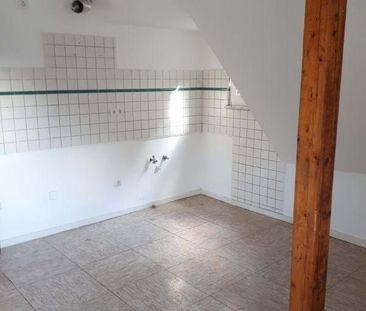 Gemütliche Dachgeschosswohnung mit Potential - Photo 2