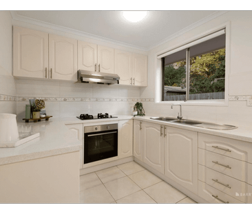 Low-Maintenance Living with Garage & Natural Light - Photo 4