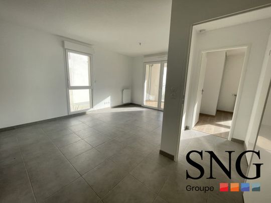 T2 AVEC LOGGIA ET UN PARKING INTERIEUR - Photo 1