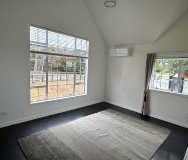 Charming 2-Bedroom Home with Spacious Attic in Waitoki - Photo 5