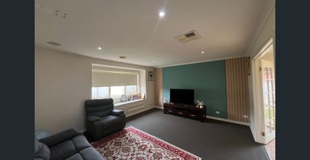 Modern 4-Bedroom Home with Multiple Living Areas - Photo 3