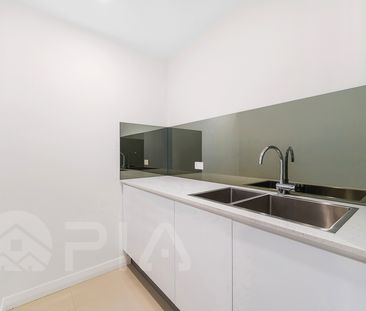 Nearly New Modern Spacious Apartments Available - Photo 1