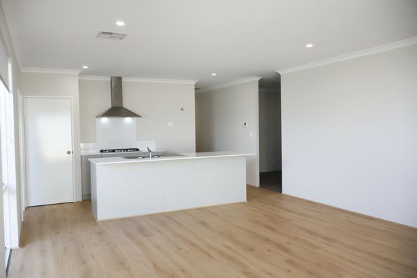 Live the Coastal Lifestyle in Brand New Four Bedroom Home! - Photo 1