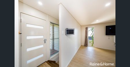 Stylish Elevated Home in Great Location - Photo 3