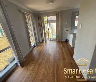 Charming Coastal Living – Space, Style & Convenience! - Photo 1